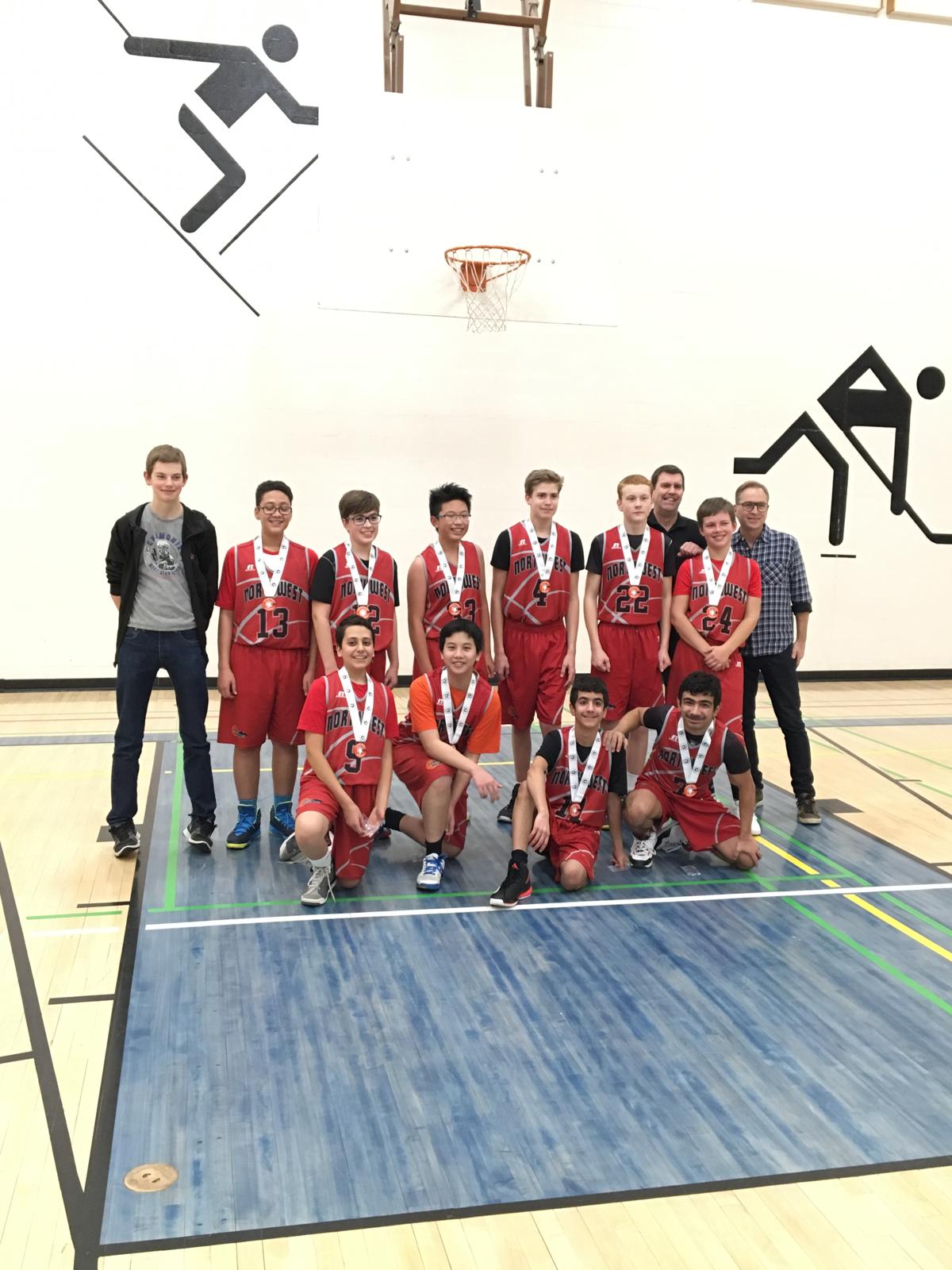 Amin with his basketball team